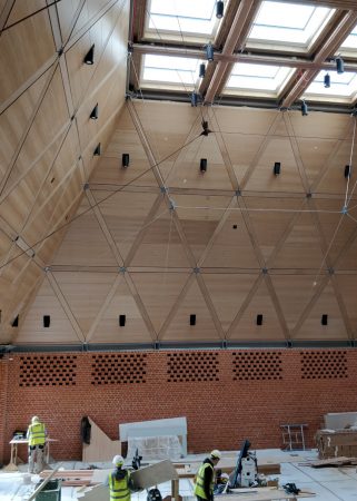 Music school interior with high wooden ceiling